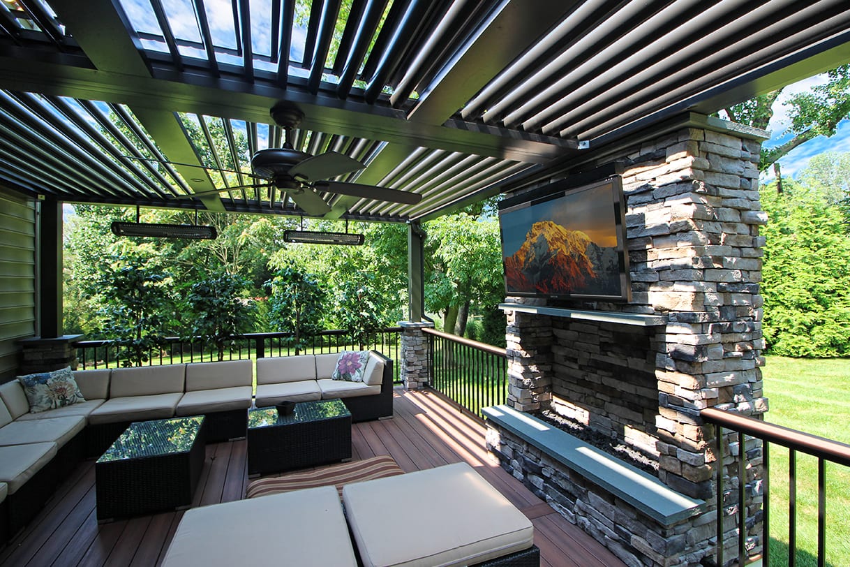 luxury outdoor patio pergola-with-TV-and-fire-feature