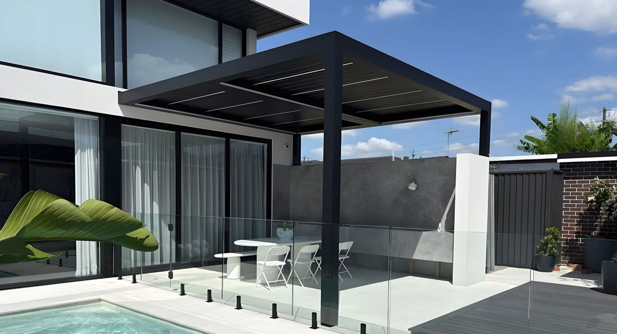 Wall-mounted aluminum pergola attached to a house Wall-mounted aluminum pergola attached to a house